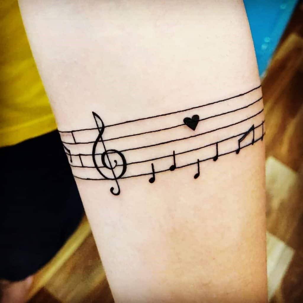 Little Tattoos — Floral armband tattoo. Tattoo artist: Banul